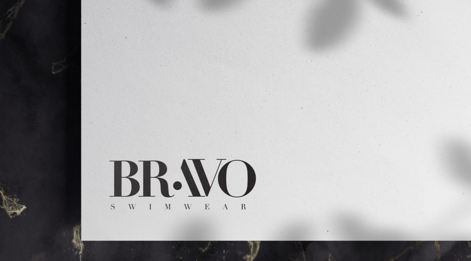 Bravo Swimwear logo lockup on paper